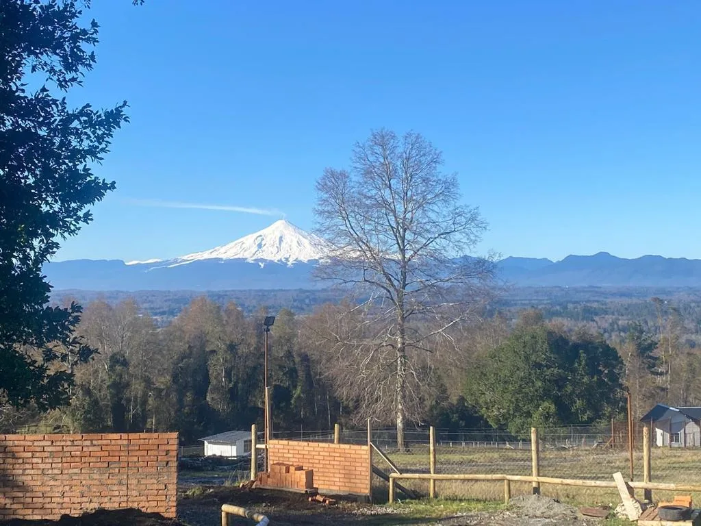 Parcela Villarrica con casa en construcción, foto 1